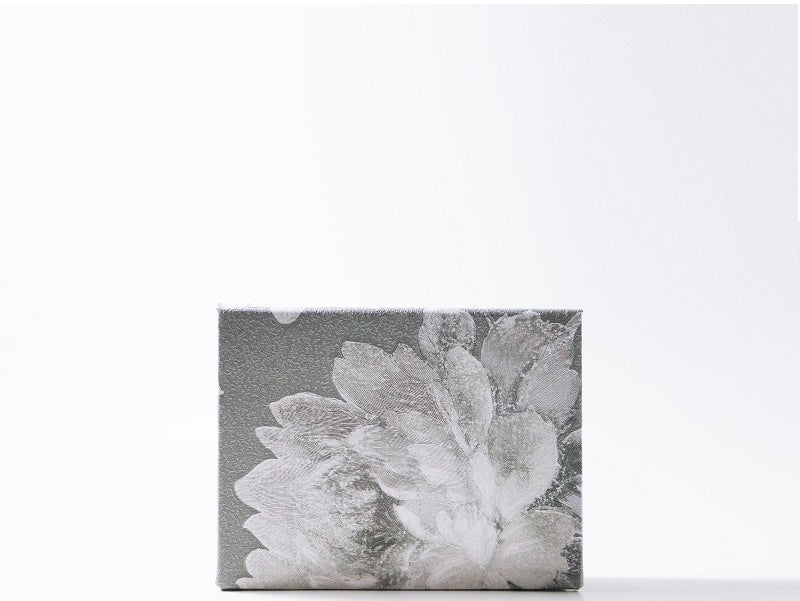 Classic white flower makeup palette, modern box for organized makeup collection. Ofelia
