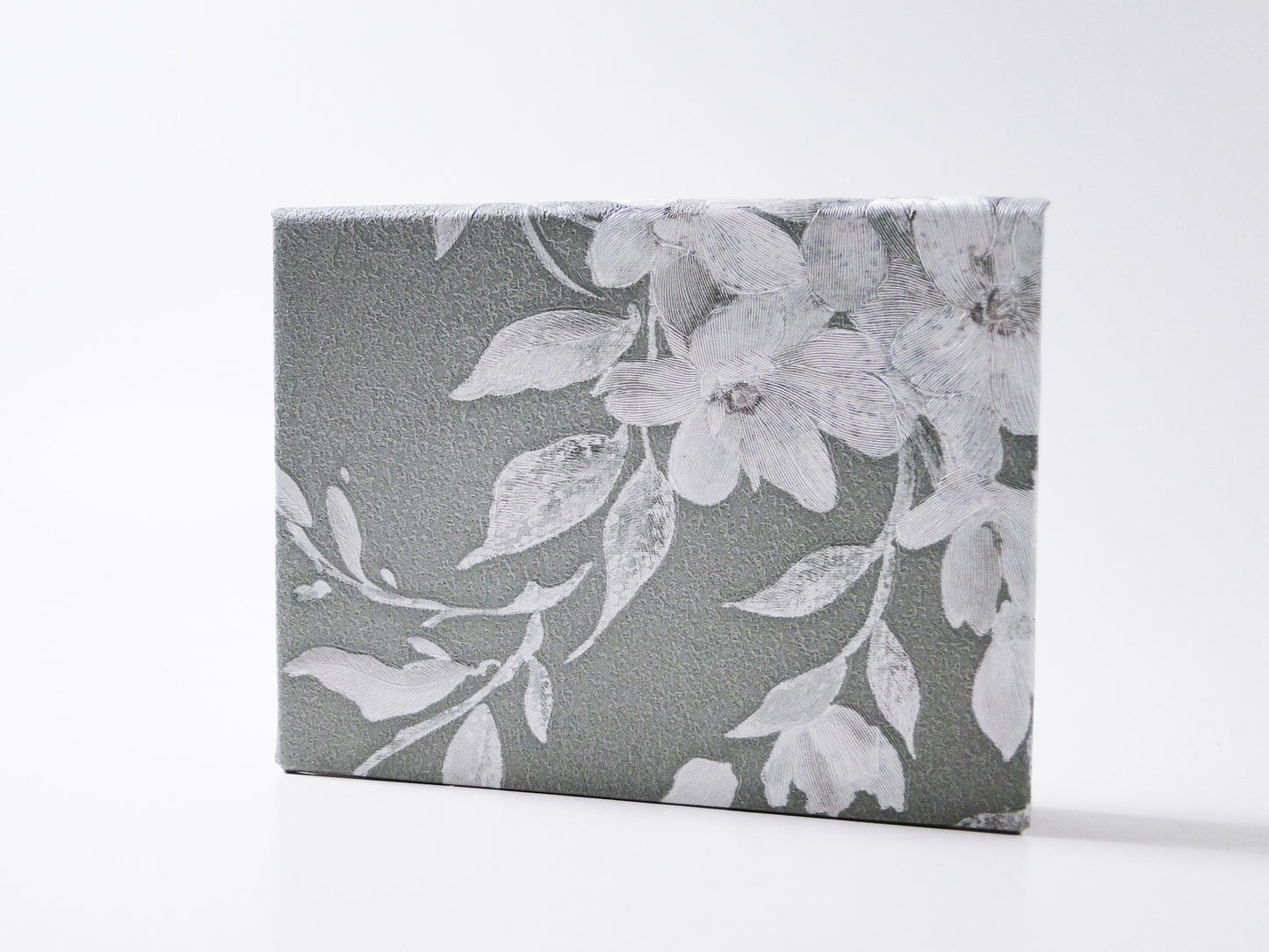 Classic white flower makeup palette, modern box for organized makeup collection. Ofelia